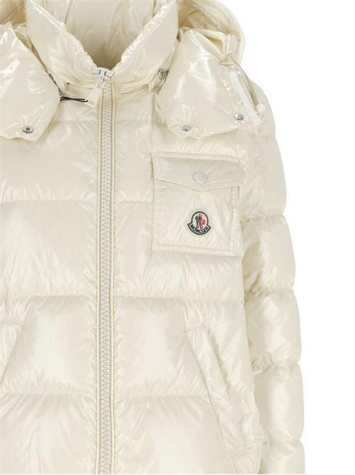 Andro down jacketA timeless garment perfect for urban life, the Andro down jacket is ideal for completing looks for the office and free time. Made from nylon, this short puffer jacket features a lightweight longue saison lining and a removable hood. The iconic patch pocket on the chest adds the final touch of style to the garment. Moncler | 1A000-02597EU10W